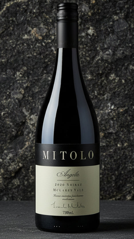 Wine bottle with Mitolo label on a gray background